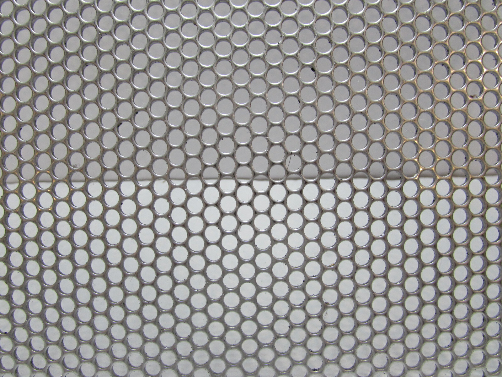 5/32″ ROUND HOLE ON 3/16″ STAGGERED 18 GA. STAINLESS PERFORATED SHEET-17″ X 40″
