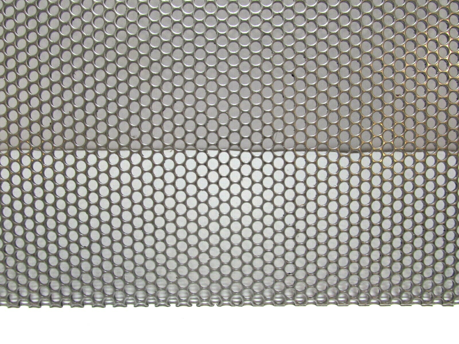 5/32″ ROUND HOLE ON 3/16″ STAGGERED 18 GA. STAINLESS PERFORATED SHEET-17″ X 40″