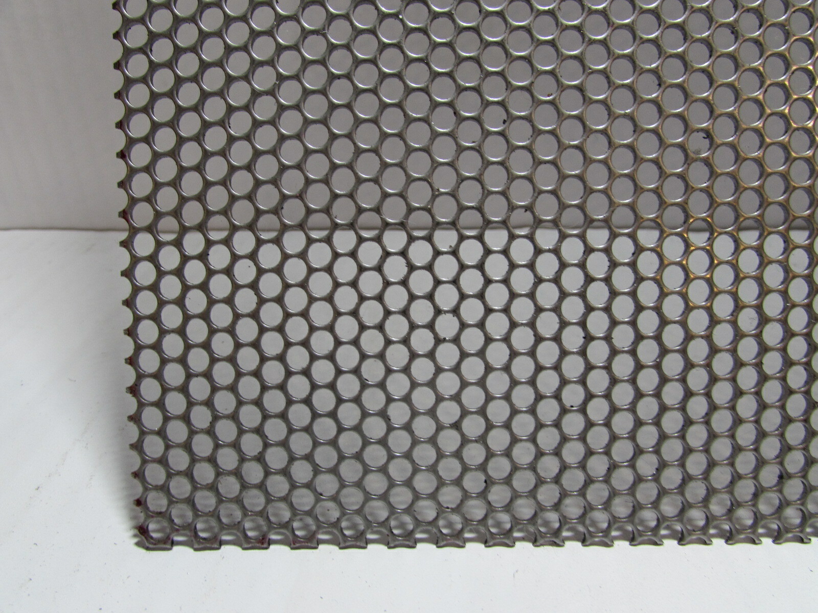 5/32″ ROUND HOLE ON 3/16″ STAGGERED 18 GA. STAINLESS PERFORATED SHEET-17″ X 40″