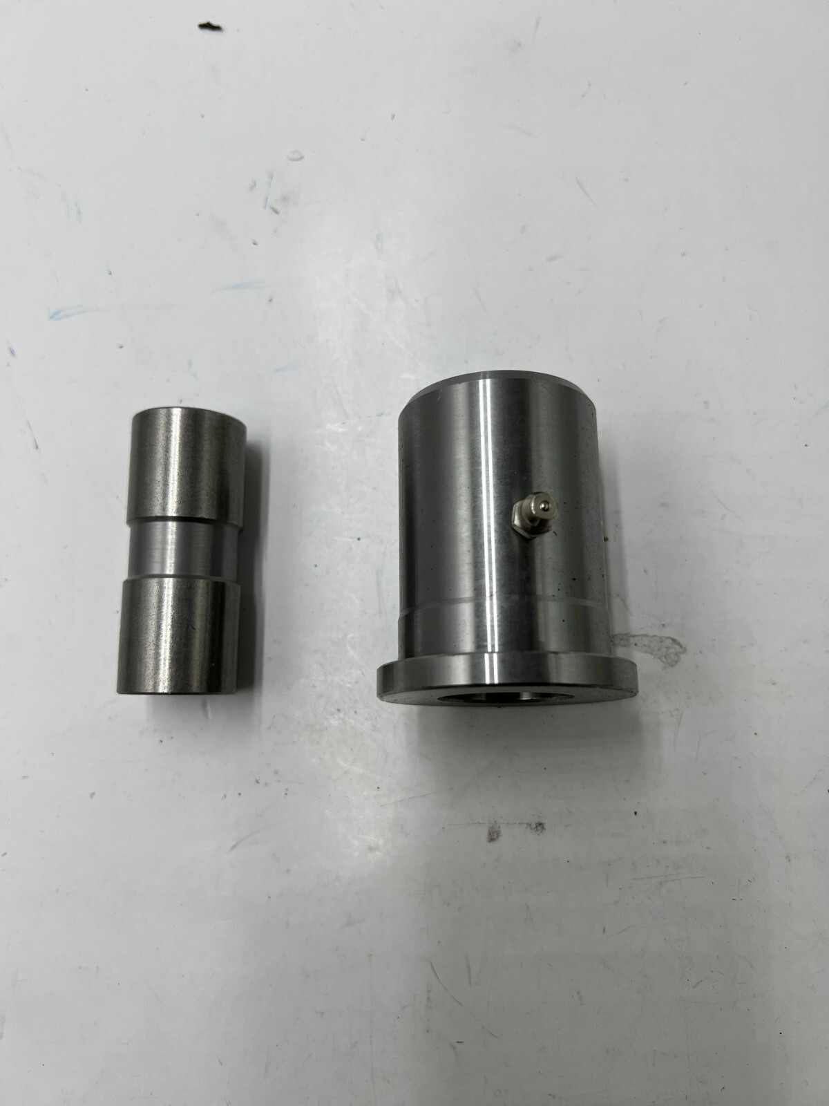 Sleeve and Bushing 2 1/4 Inches Long 2 Inches Diameter Silver